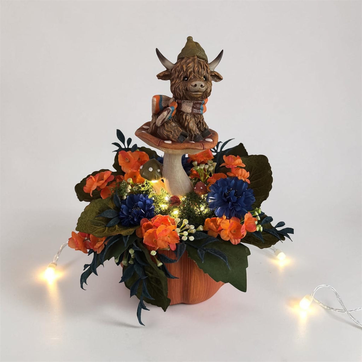 Biscuit's Mushroom Garden Floral 
10"L x 8"D x 12"H